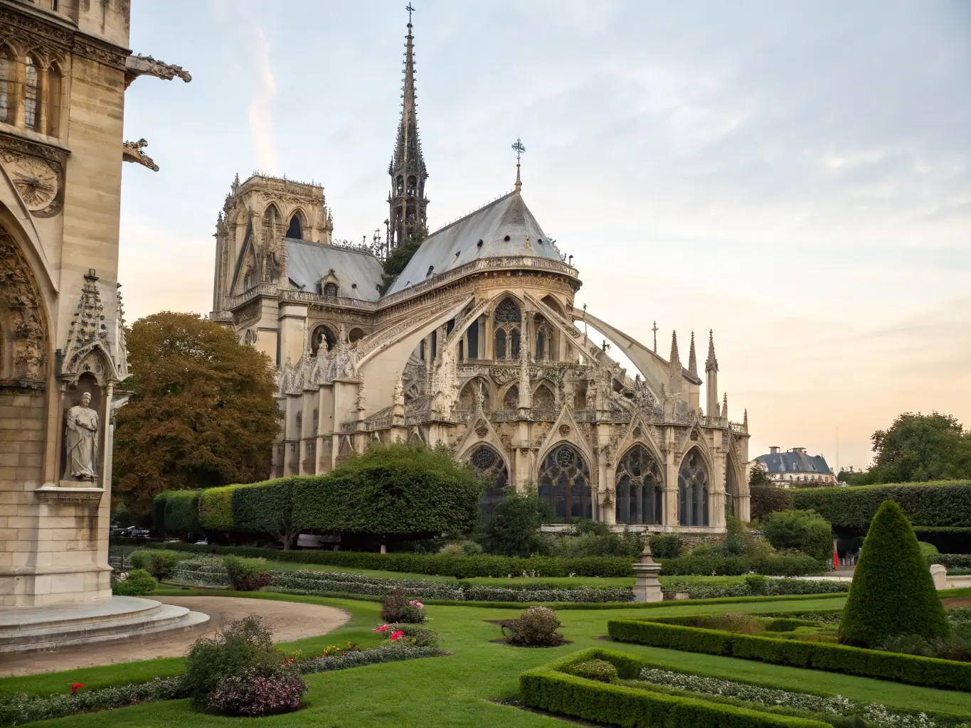A photograph of the Notre-Dame de Bringolo's bell tower, highlighting the ongoing efforts to preserve and maintain this iconic structure.